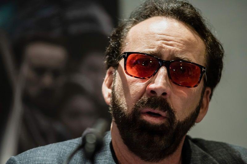 Nick Cage Red Glasses