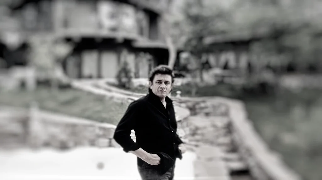 The legendary musician Johnny Cash standing in front of Rose Hall.