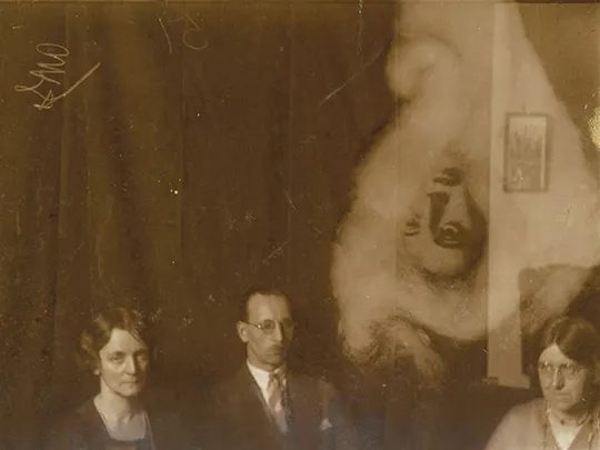 An old photograph allegedly capturing a spectral face in a mirror